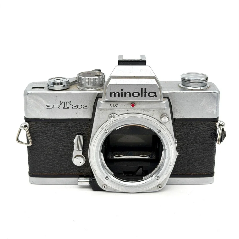 Minolta SRT 202 35mm SLR Film Camera Body Silver Black Vintage 2396308